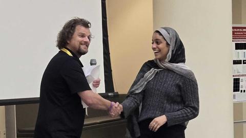 Wasan receiving poster award